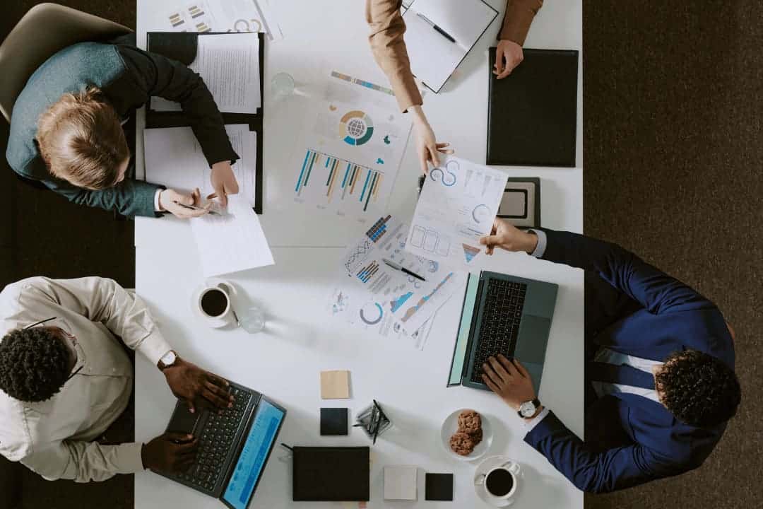 team collaborating on high-volume document translation services project